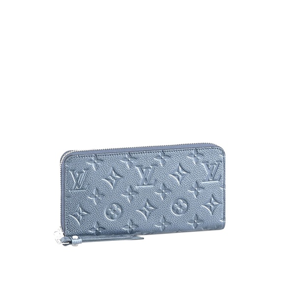 Louis Vuitton Handbags - RARE Louis Vuitton Baby Blue Empreinte Monogram Zippy Wallet